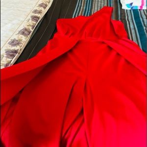 Girls red one piece capri jump suit with long drap in back